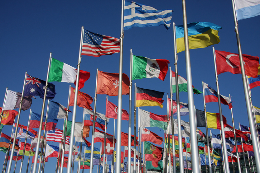 Verschiedene Flaggen, Symboldbild für die Welthandelsorganisation; Quelle: Fotolia.com/Marcel Schauer